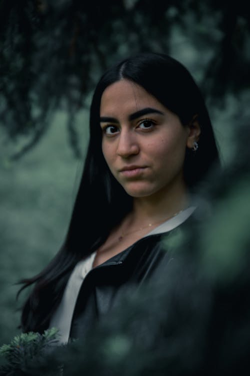 Woman in Black Jacket Posing