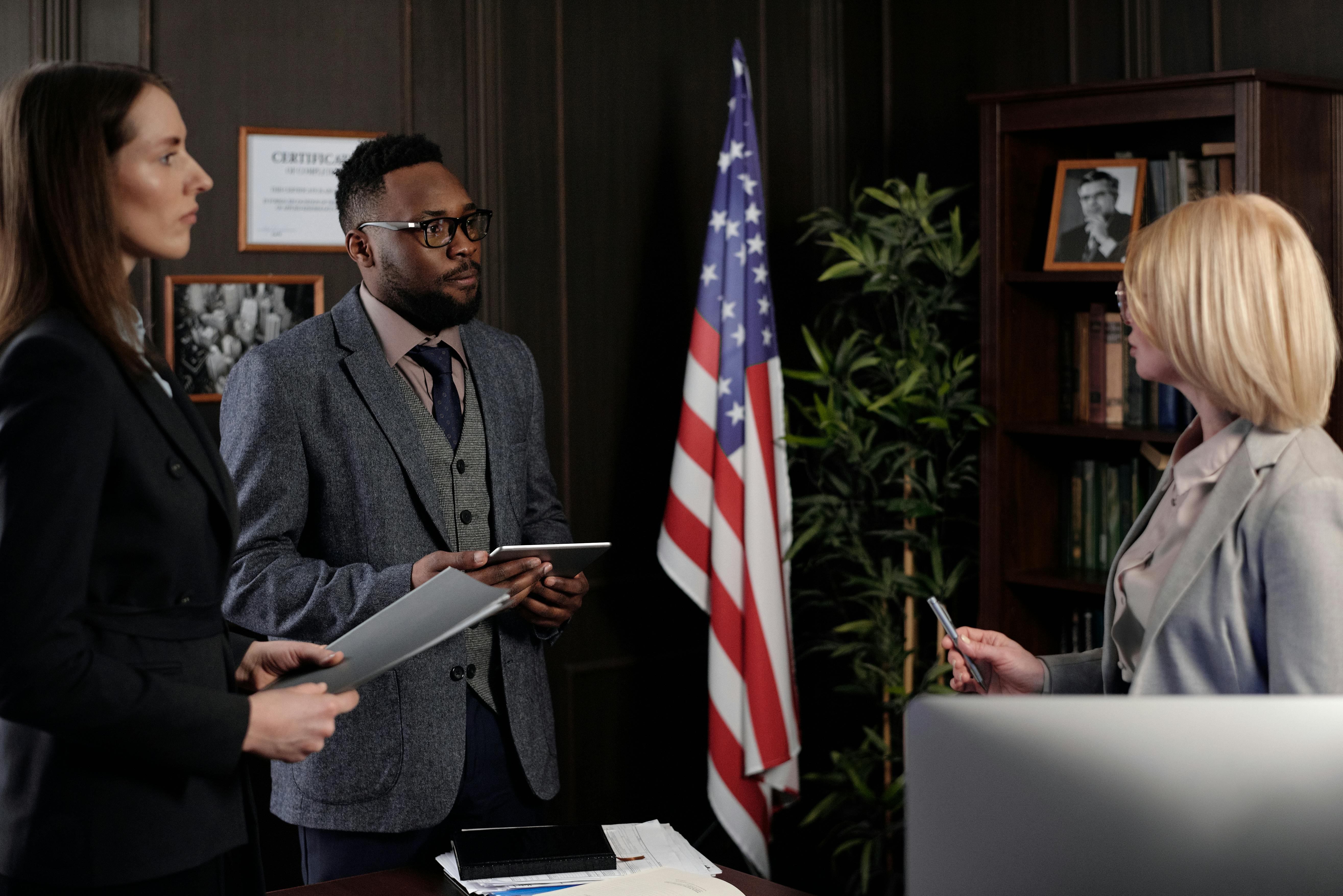 Lawyers Talking in an Office · Free Stock Photo