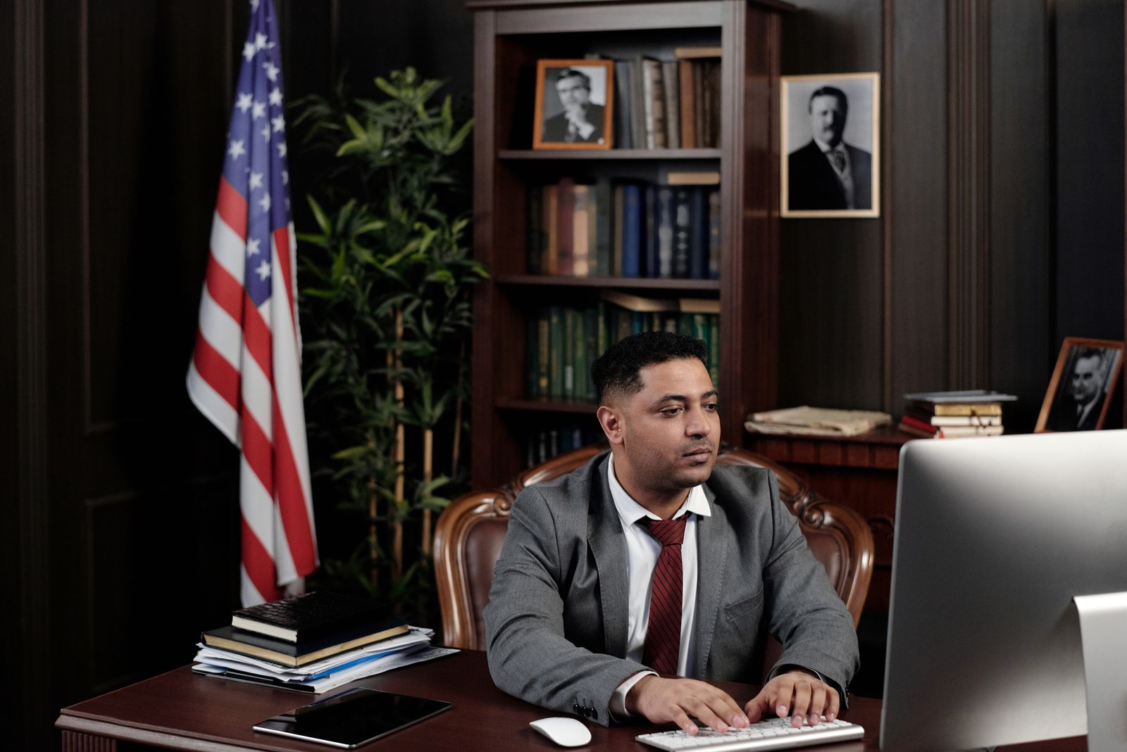Attorney working at his computer in a law office