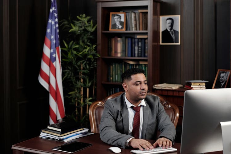 Lawyer Working On His Computer