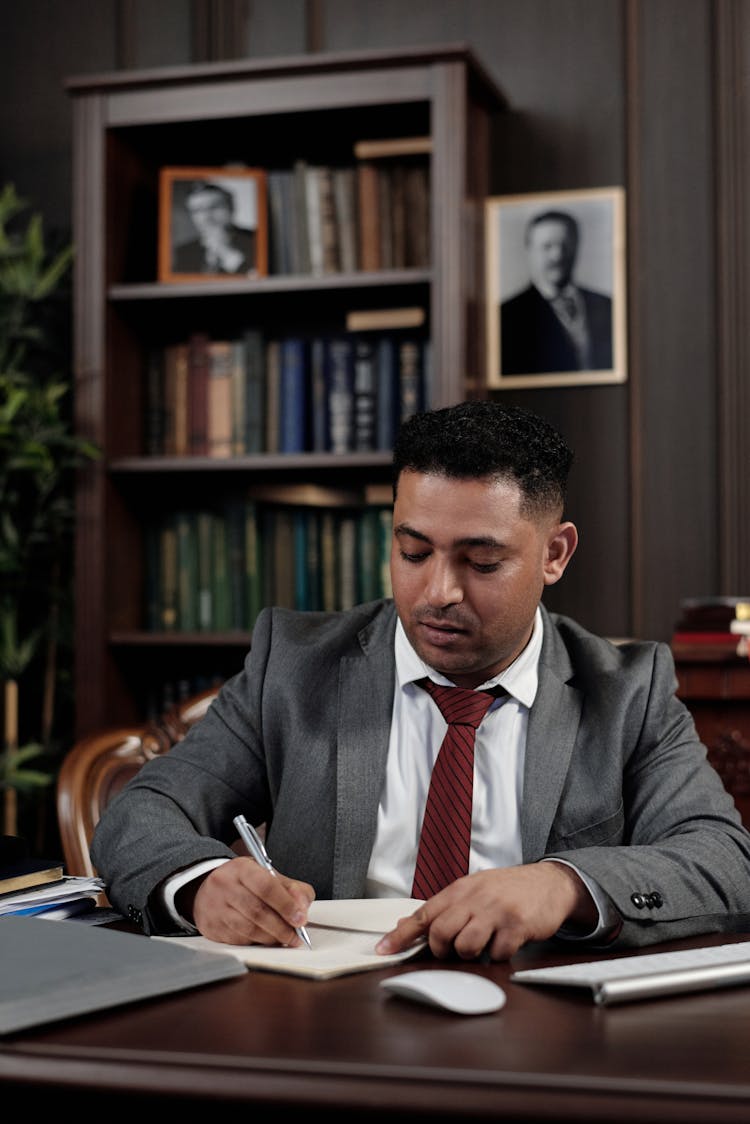 Businessman Signing A Document