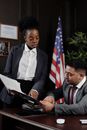 Lawyers in an Office Looking at Documents