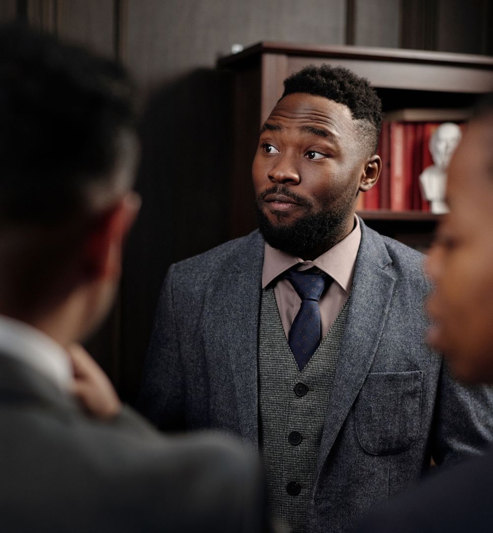 A seasoned executive advising in a meeting