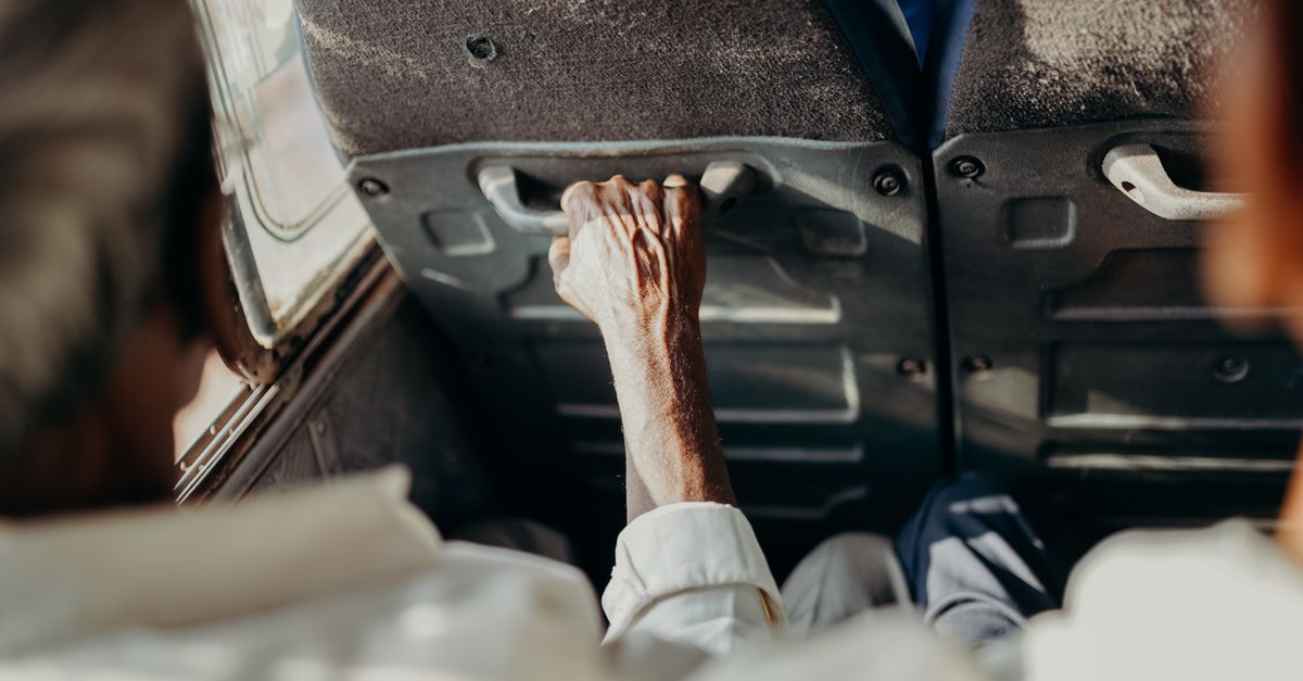 Close-up of passengers on a bus, highlighting the essence of road travel in India.