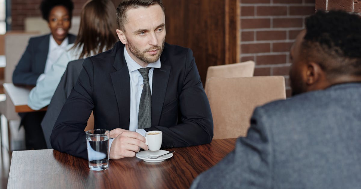Intense Focus On Two People In A Busy Café, Ignoring Distractions