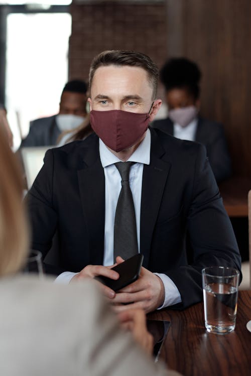 Photo of Man wearing Black Suit and Face Mask
