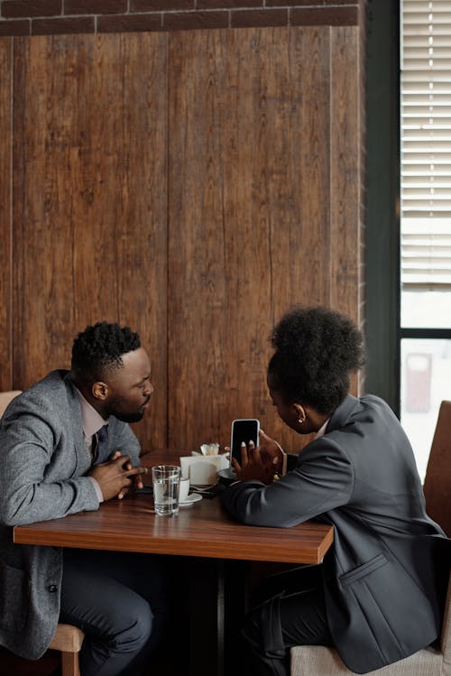 Coworkers Sitting at a Café