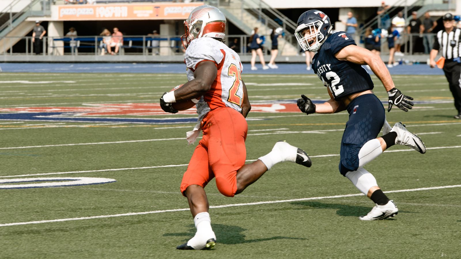 Representative photograph of American football players competing at a stadium; not the Indiana–Michigan game