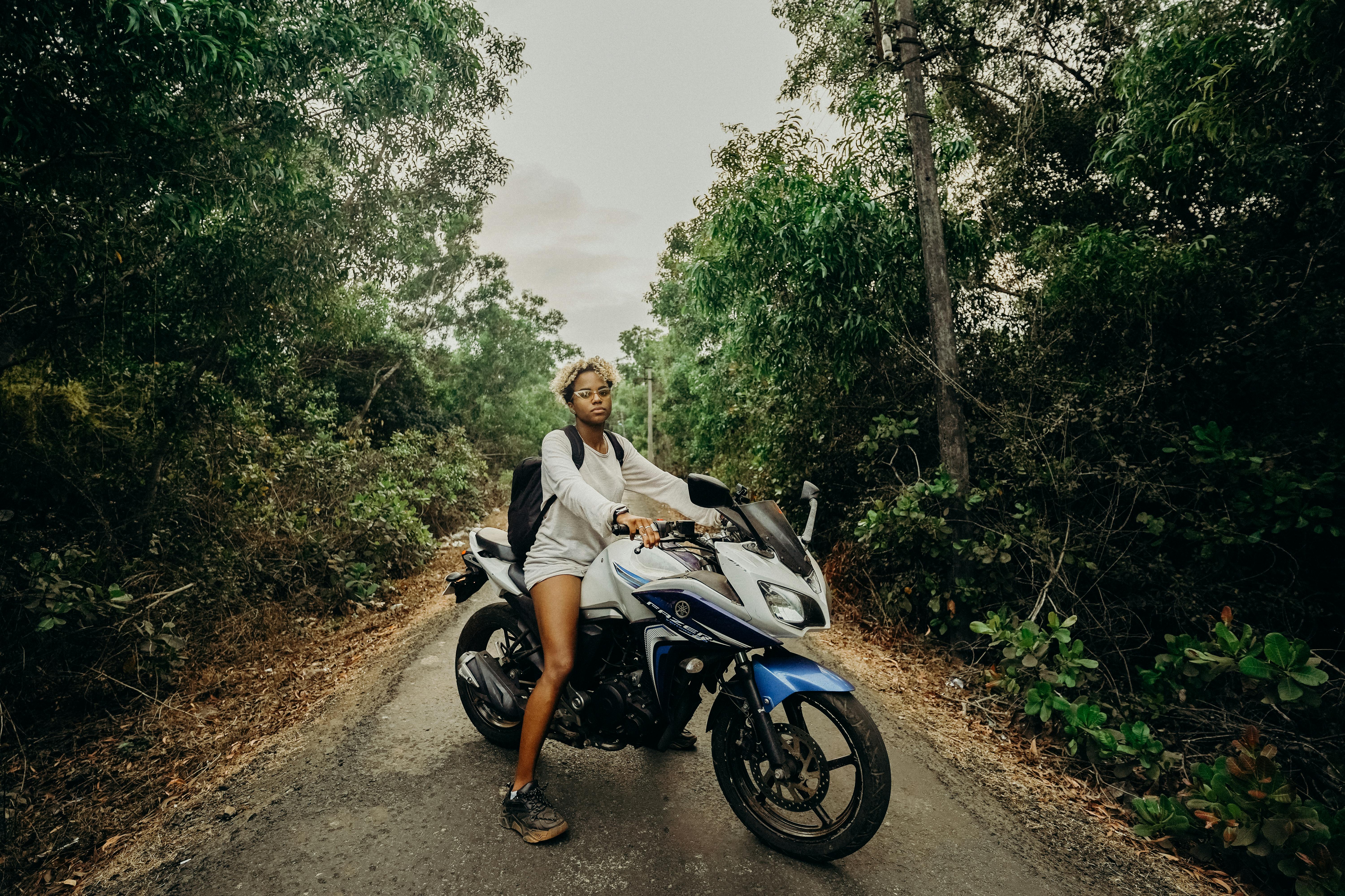 Man and Woman Riding on Motorcycle · Free Stock Photo