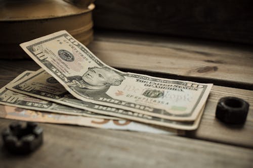 Ücretsiz 10, amerikan doları, banknotlar içeren Ücretsiz stok fotoğraf Stok Fotoğraflar
