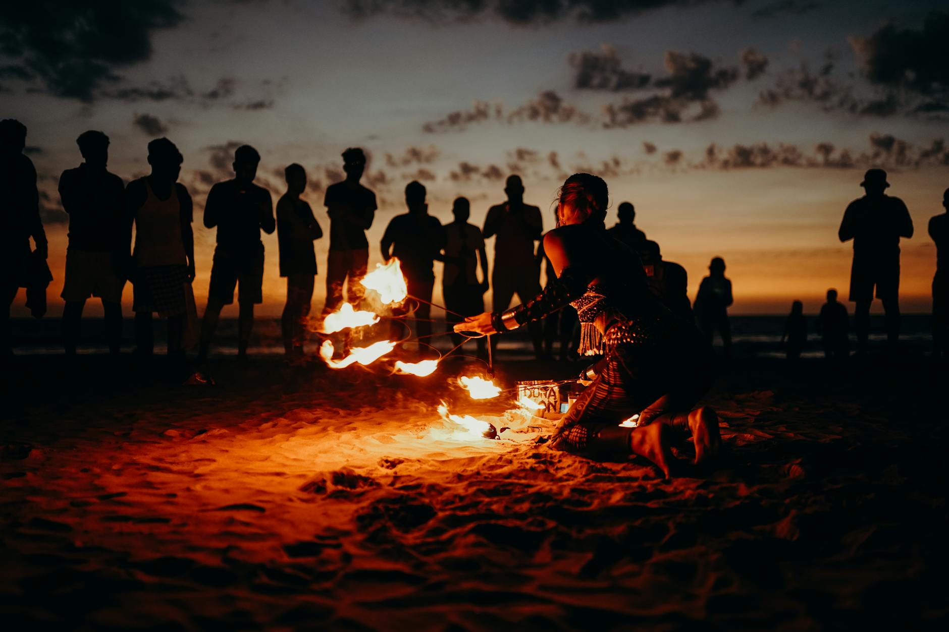 https://www.pexels.com/photo/people-standing-on-beach-during-sunset-4430322/