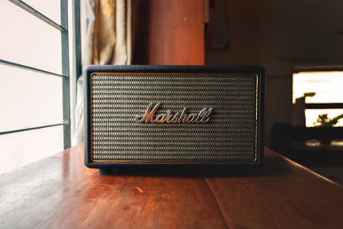 Free Photograph of an Amplifier on a Wooden Surface Stock Photo