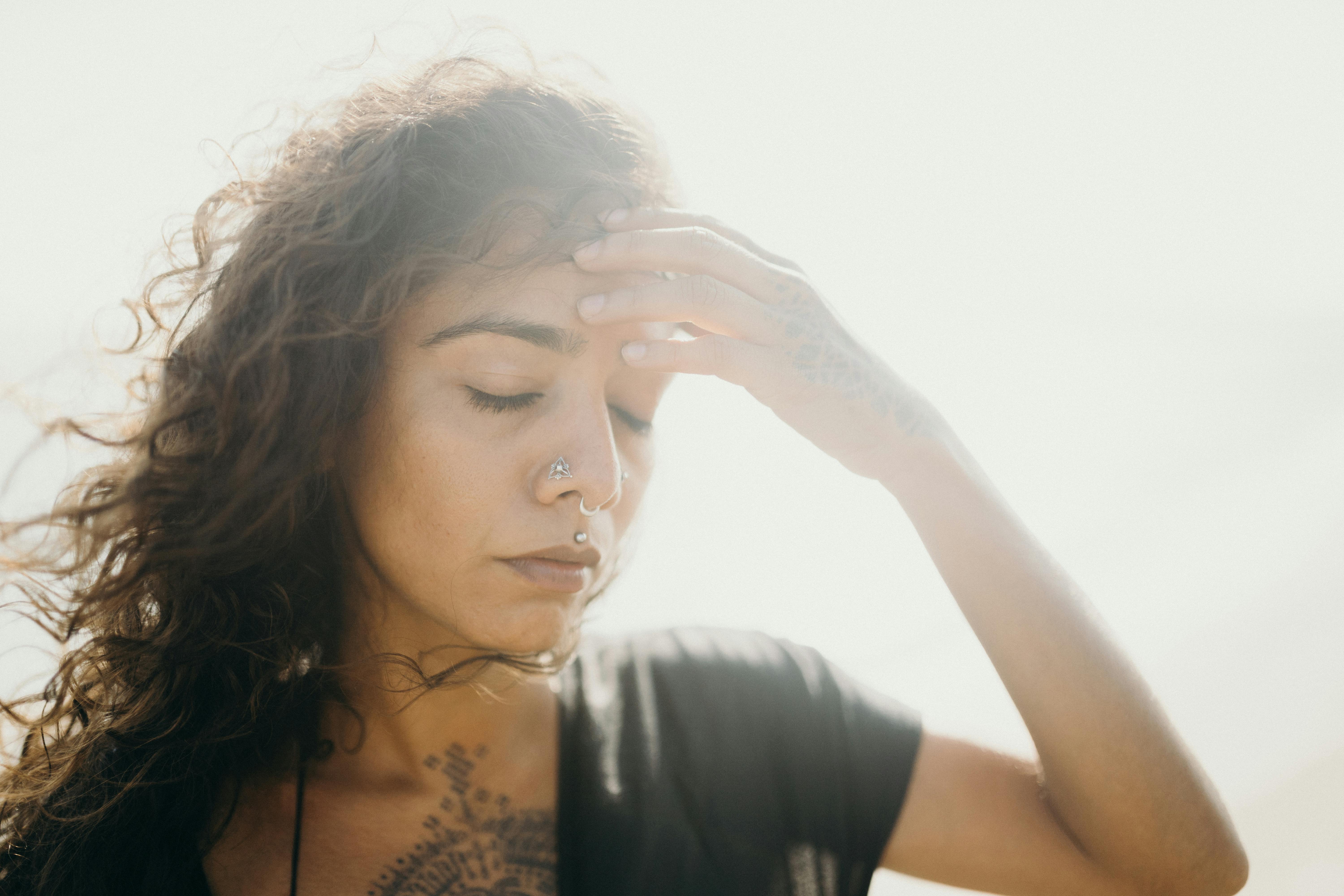 Woman in Black and Brown Floral Tank Top