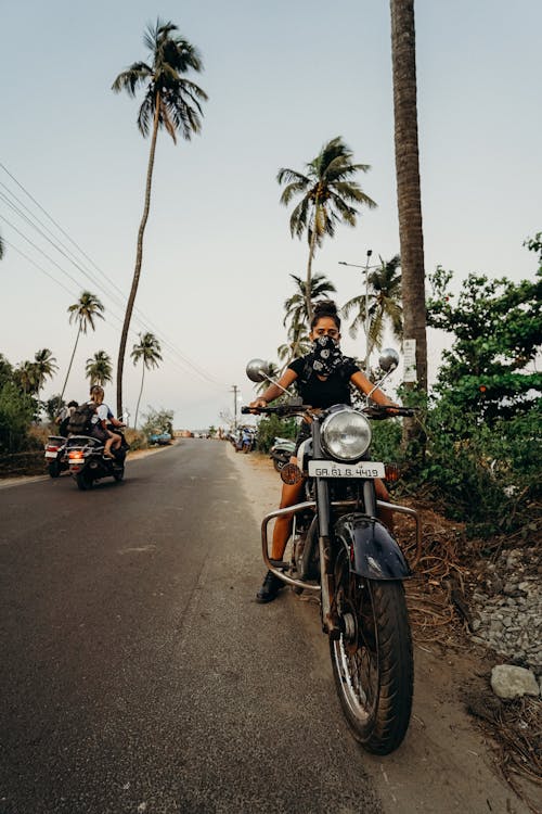 Woman Riding Motorcycle