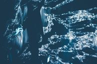 Splashing clean water with silhouette of person
