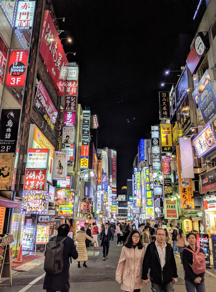 People Walking At A Street In Shinjuku