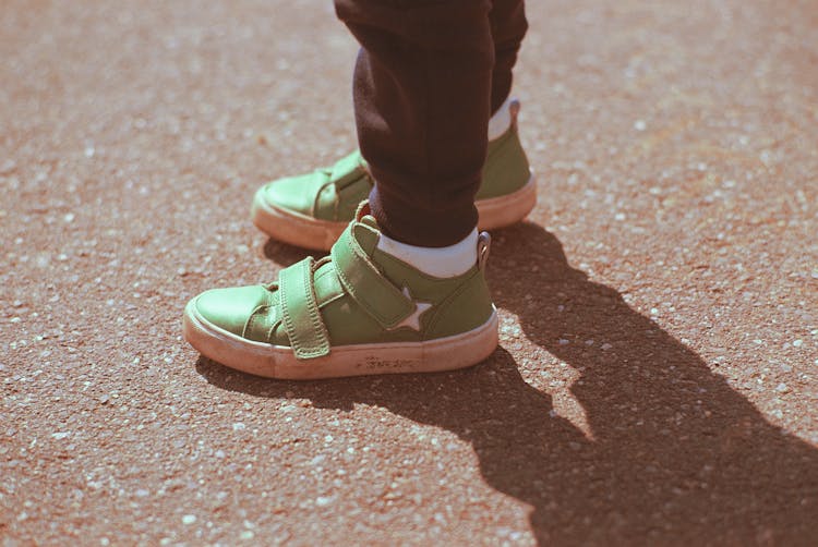 Person Wearing Green Sneakers