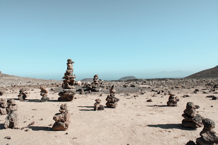 Stacks Of Brown Rocks On Sand