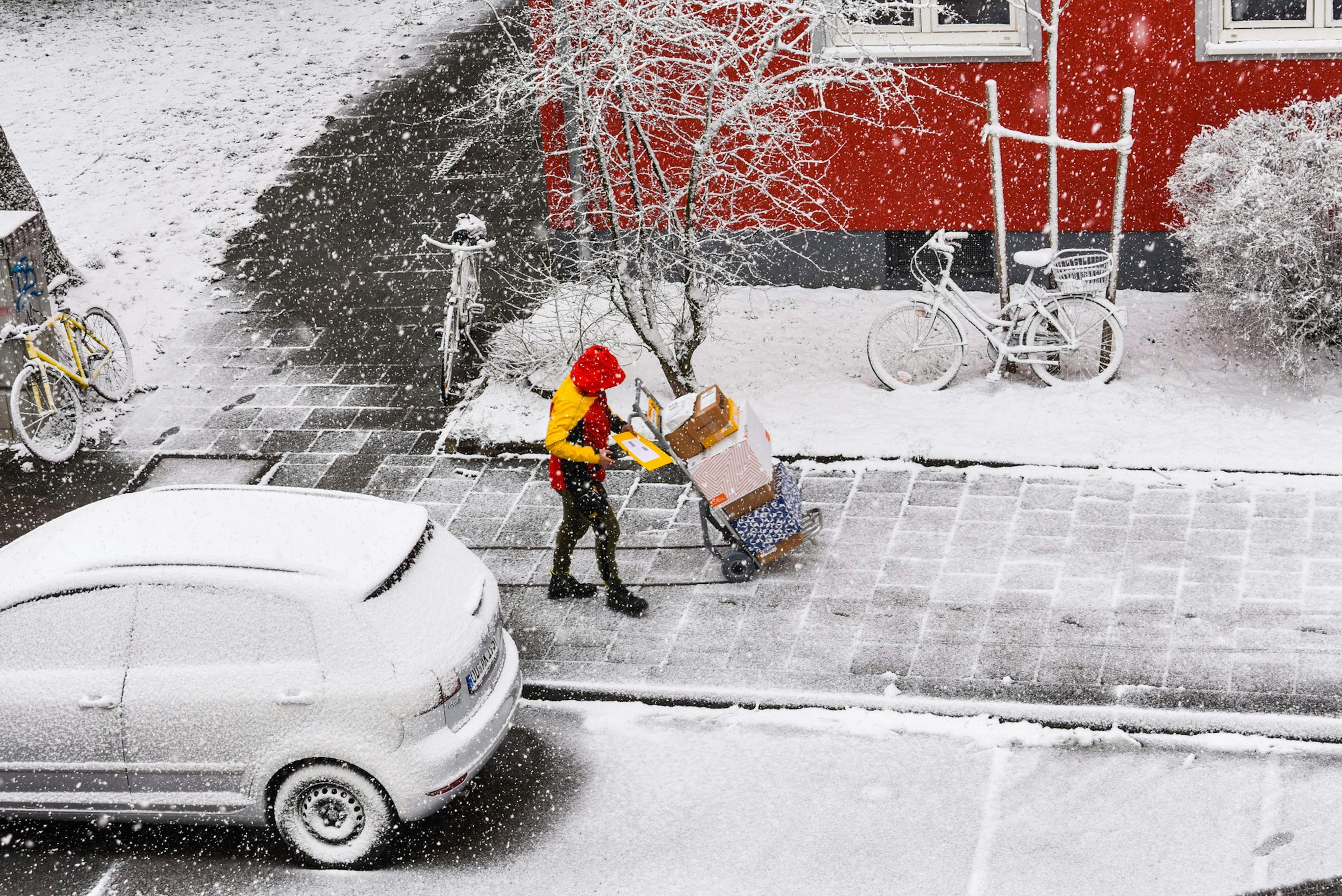 snow covered car in garage