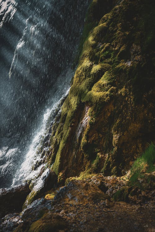 Free Water Falls on Brown Rocky Mountain Stock Photo