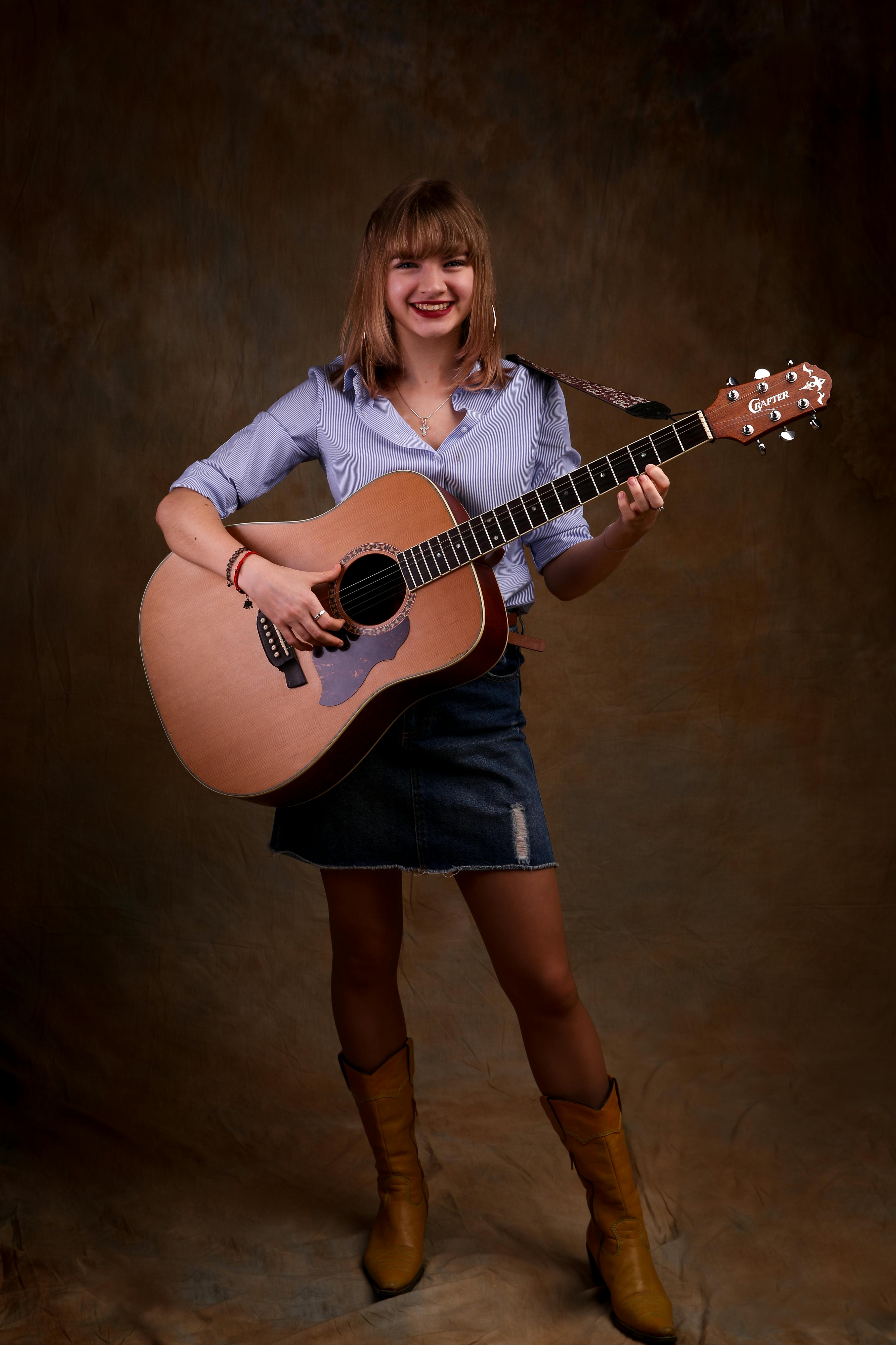 female acoustic guitarist