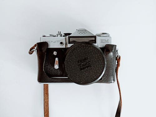 Old fashioned photo camera in leather case