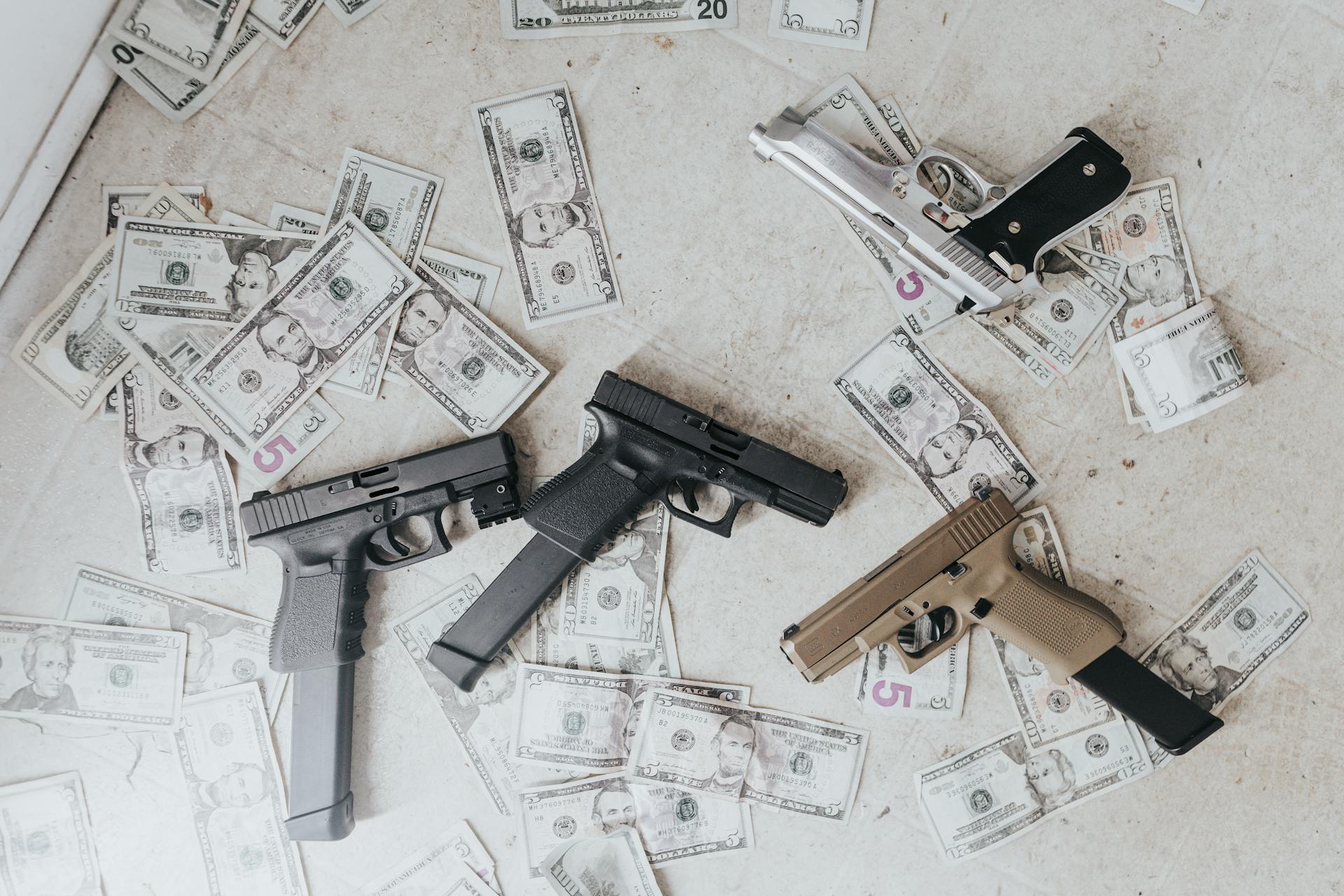 Guns and Banknotes on the Floor