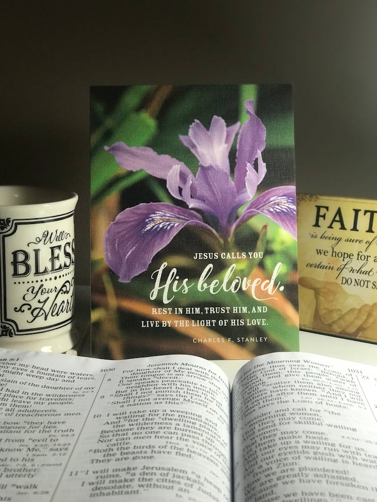 Cup Of Coffee And Christian Books On Table