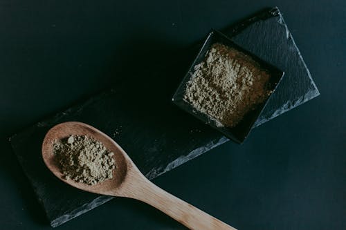 Close up of Brown Sugar and a Wooden Spoon