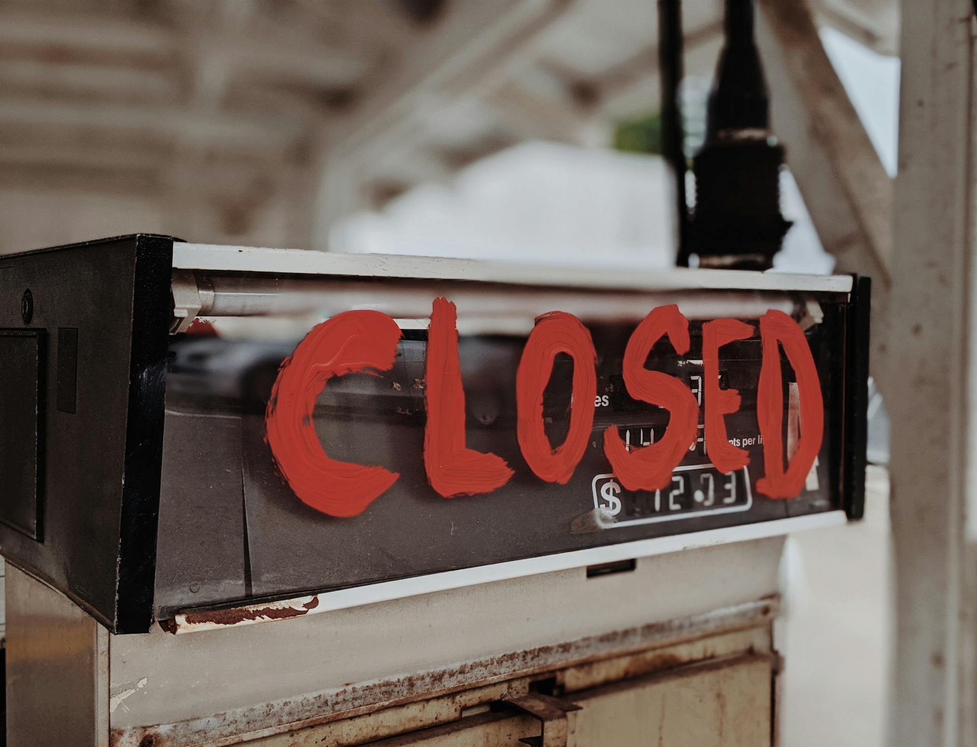 Closed Sign on a Gas Pump