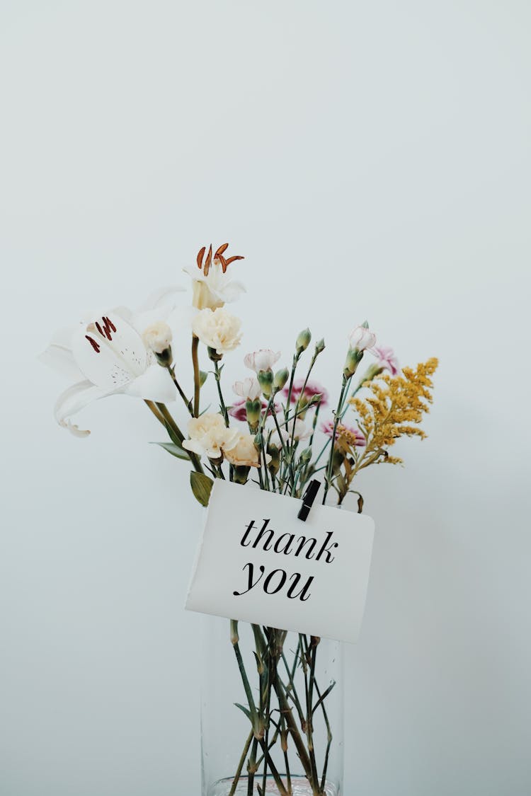 Bunch Of Flowers With A Postcard