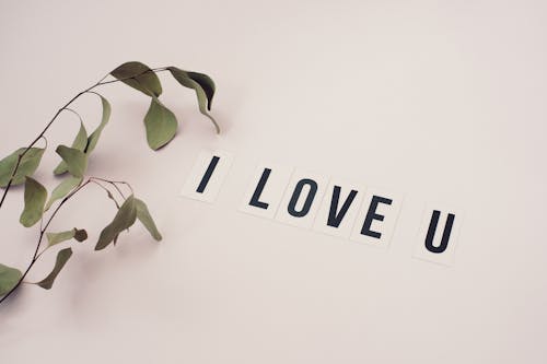 Free I Love You on White Surface Stock Photo