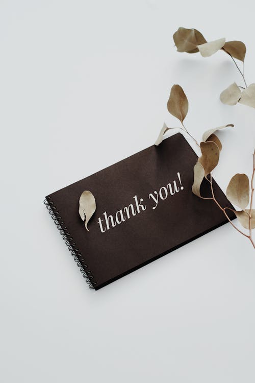 Free Thank You Printed on a Notebook Stock Photo