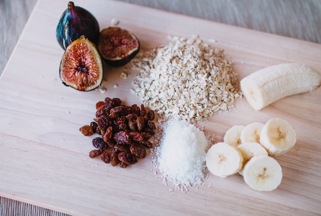Brown and White Round Fruits on Brown Wooden Table
