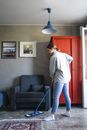 A Woman Mopping the Floor