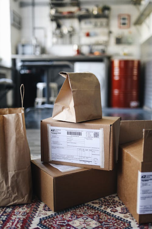 Boxes and Paper Bags on the Floor