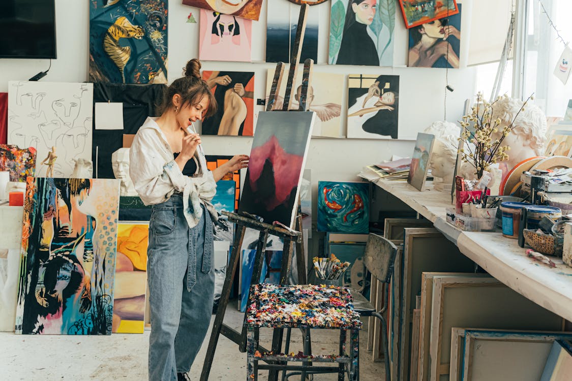 Free A Woman Doing Painting Stock Photo