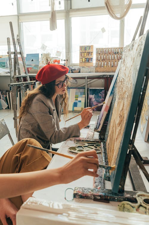 Woman Painting on a Canvass