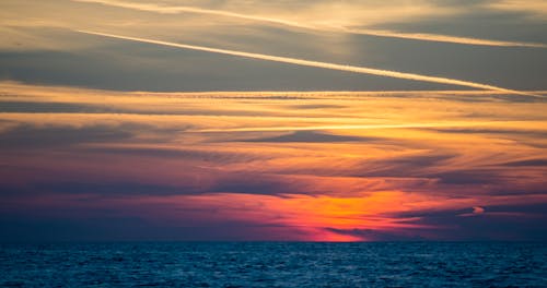 Gratis lagerfoto af hav, skyer, solnedgang