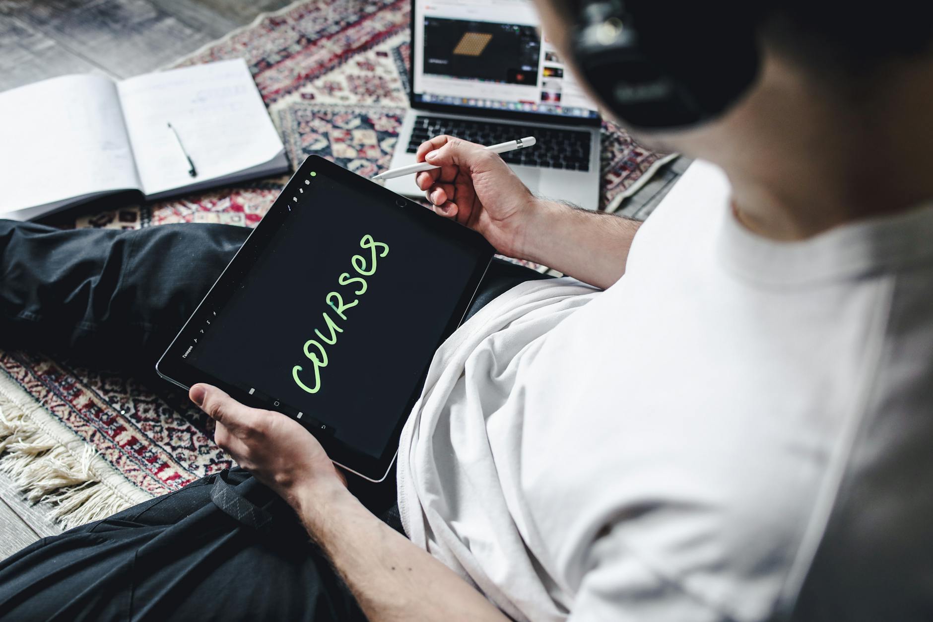 https://www.pexels.com/photo/a-person-holding-a-digital-tablet-4443160/