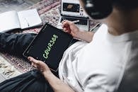 A Person Holding a Digital Tablet