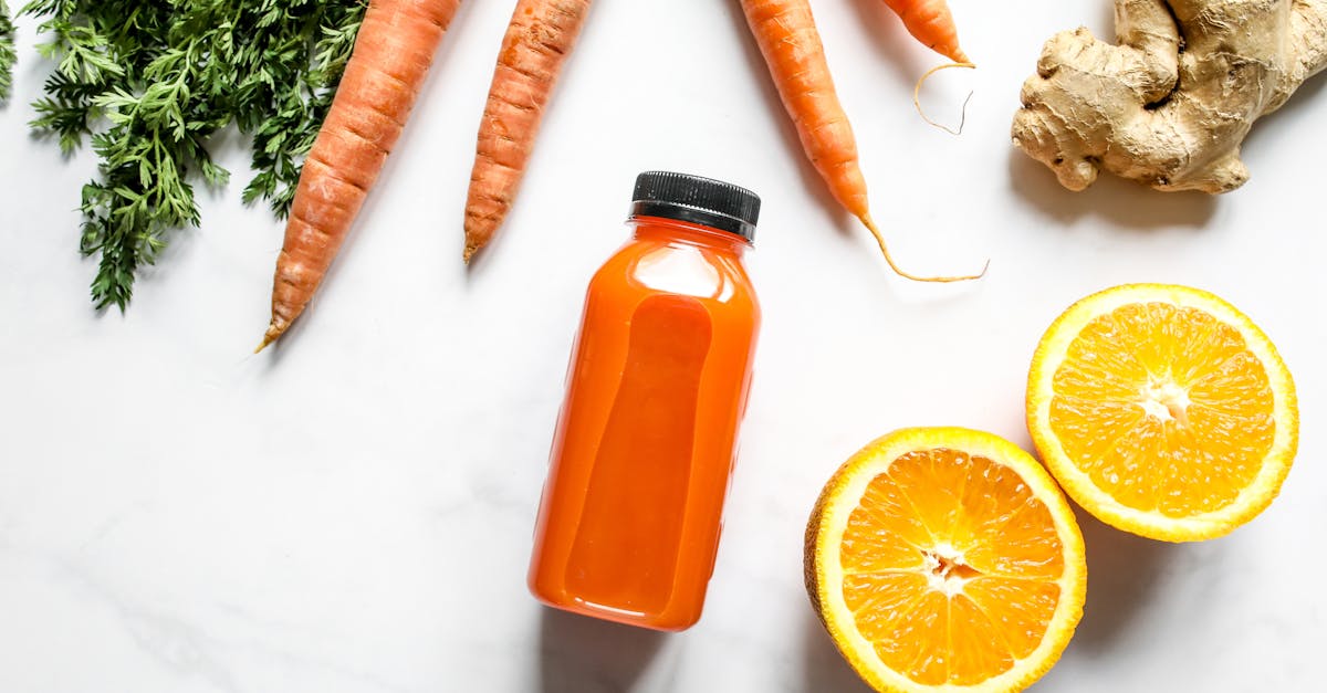 Vibrant carrot and orange juice with ginger, perfect for a nutritious start to the day. Vibrant carrot and orange juice with ginger, perfect for a nutritious start to the day.