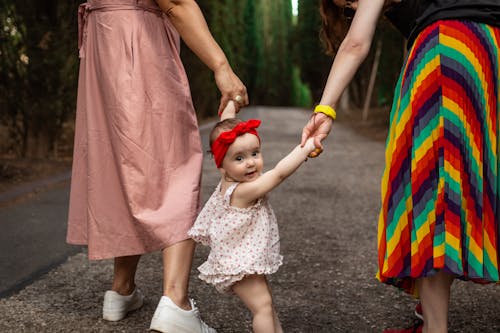 A Girl in Pink and White Dress