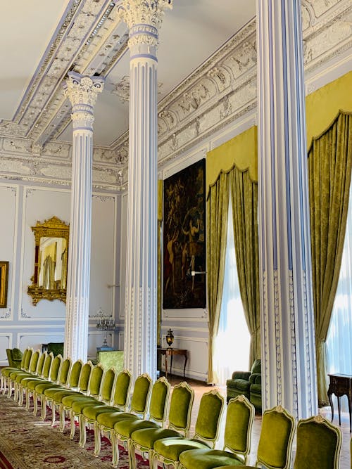 Row of chairs in classical spacious palace hall