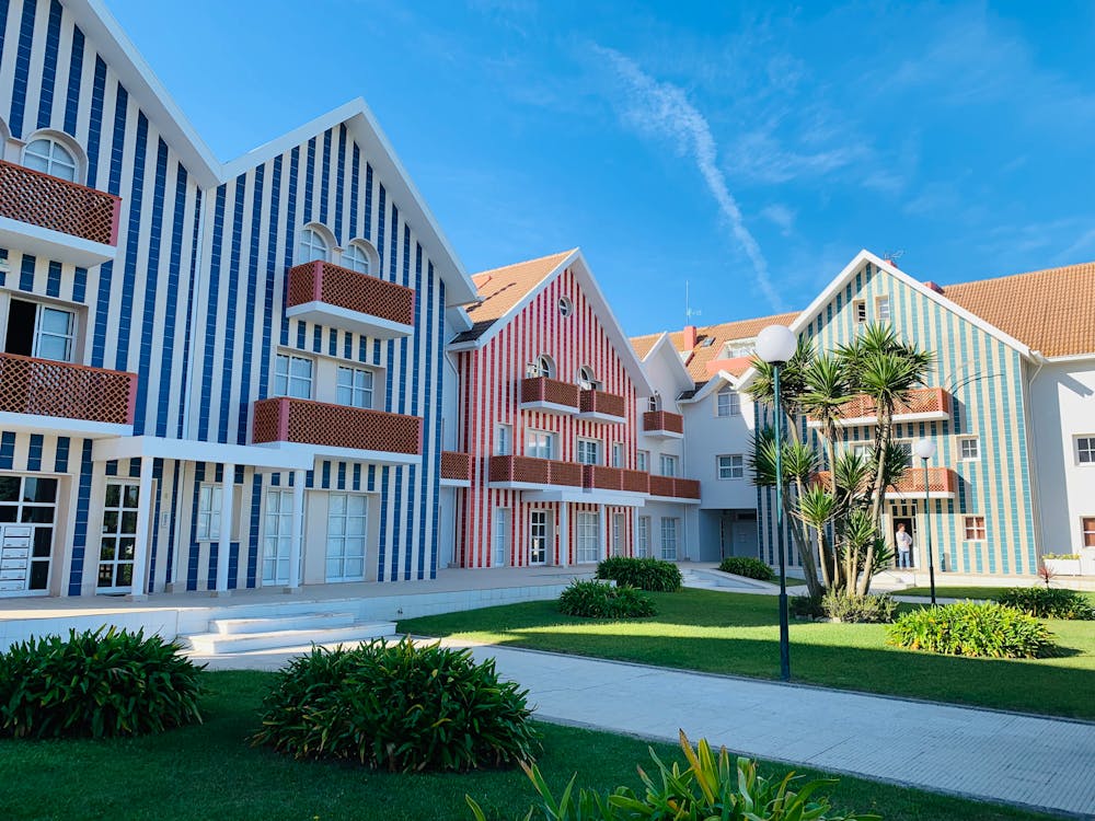 Free Modern Residential Townhouses With Spacious Green Yard Stock Photo