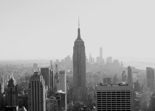 Grayscale Photo of City Buildings