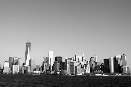 Grayscale Photo of City Skyline