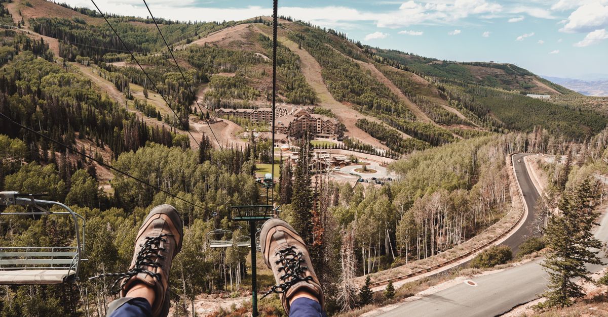 Experience the breathtaking mountain scenery from a chairlift in Park City, Utah. Ideal for adventur