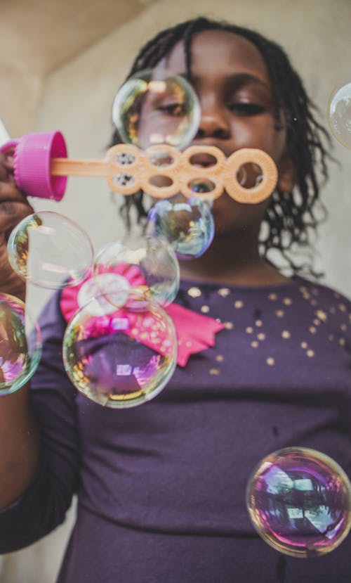 Girl Blowing Bubbles