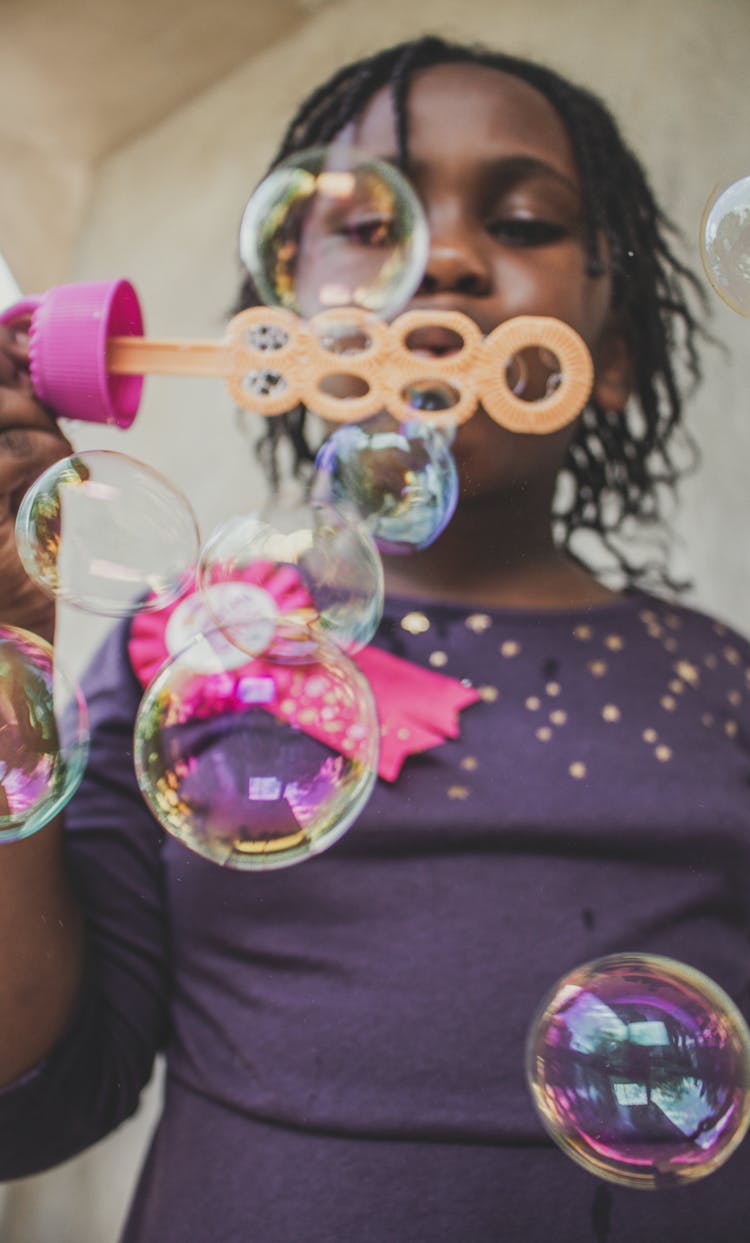 Girl Blowing Bubbles